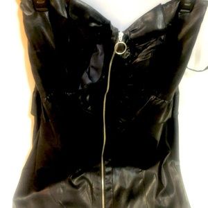 It’s a beautiful black leather dress in great condition!